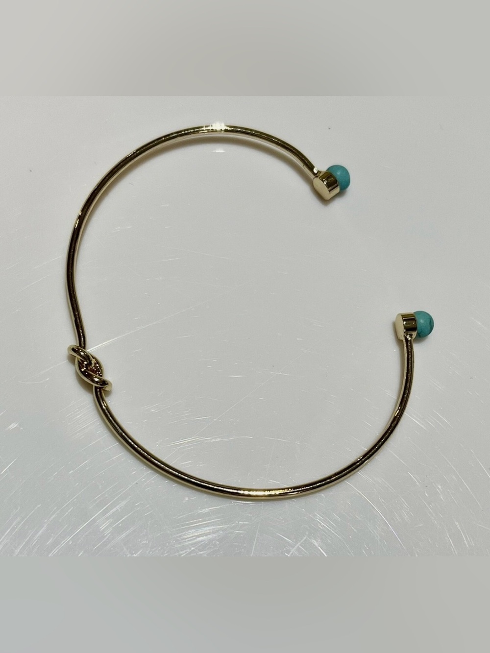 PLUNDER “JANIE” GOLD TONE CUFF/BANGLE BRACELETS W/ KNOT AND TURQUOISE ACCENTS